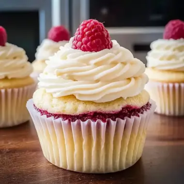 Almond Wedding Cake Cupcakes With a Raspberry Twist